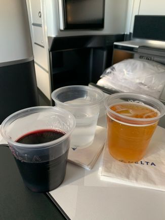 Bordeaux, water, and juice! They actually had two reds to choose from on this flight...