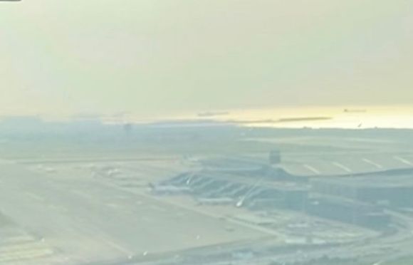 Landing through the dawn mist at…
