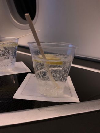 G&T after takeoff, in the flimsiest plastic cup I have ever used....   