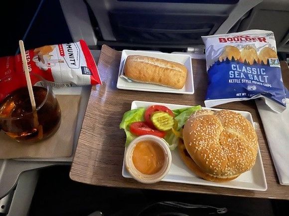 AS 143 SEA-ANC 4/22/2024

I have had the burger many times and really like it. It had been served with fruit in the past so I grabbed a bag of chips from the Admirals Club in DEN to go with it. Glad I did!    I detest the new chips a lot!!!!