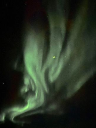 Yes, that's off topic - but a nice view of the northern lights made this flight over the north pole quite special.  (And more entertaining than the movie selection)