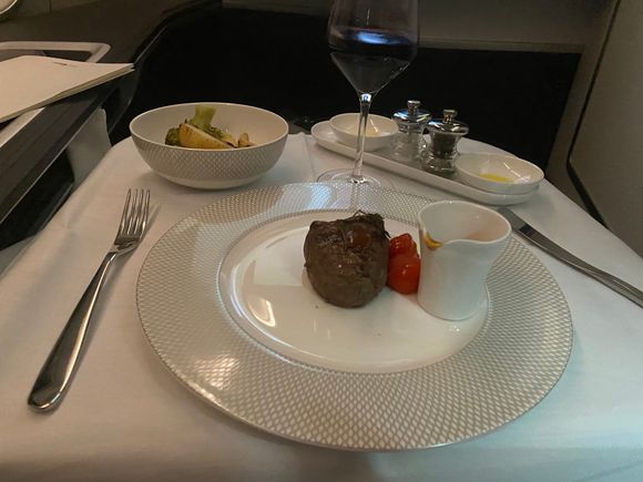 Main of grilled tenderloin of beef, enjoyed by both.