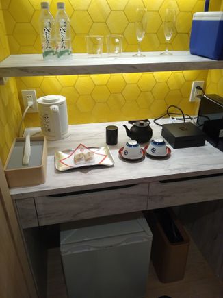 Main bathroom sink with my junk all over it, sorry! Adjacent to this to the right is the shower room with private (non-mineral) bath. 