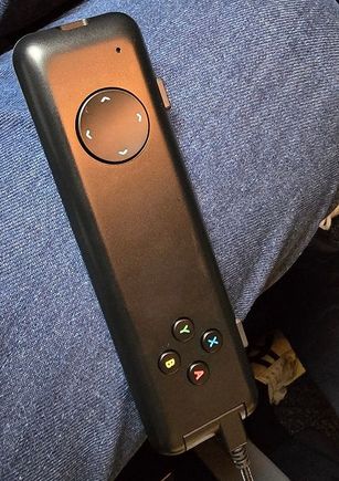 The PE remote control, basic but functional - designed for clicking through and games