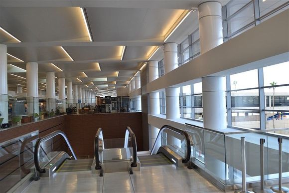Escalators down to the baggage claim. 