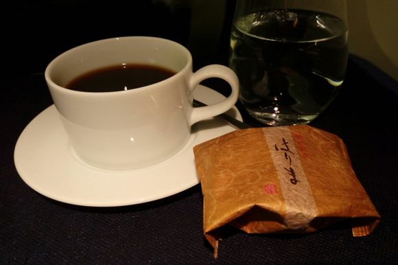 Wagashi (traditional Japanese sweets) - buttered bun with egg and white bean paste, and coffee