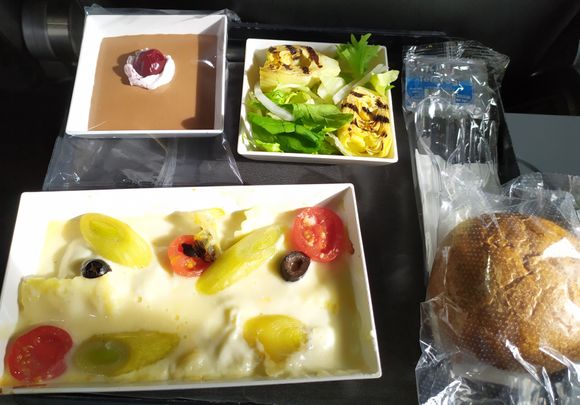 Pre-ordered meal tray of mushroom ravioli 