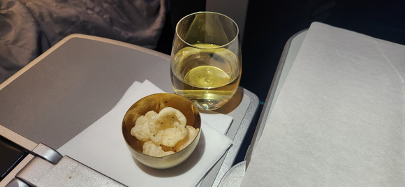 Tantos! Cacio E Pepe puffed pasta chips (these are getting really old) and the Weingut Loimer, Lois Grüner Veltliner 2022 (very good!)