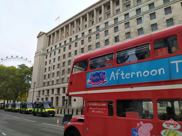 Typical London bus outside the Ministry of Defence in London