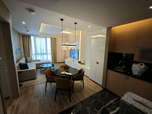 1-bd Suite - Living Room + Kitchen