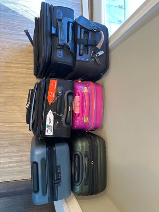The black pieces may be 1/2 to 1cm too big but the pink grey and green as def within limits. The hello kitty tagged one is a travel pro I’ve used intl for years without a problem 