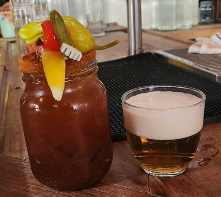 Bloody Caesar with lager back. On the other side of the Caesar is an unexpected shrimp!