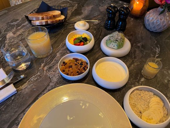 Supplementary breakfast items served before main course.