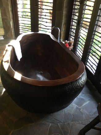 One of the two bath tubs, hand-carved
