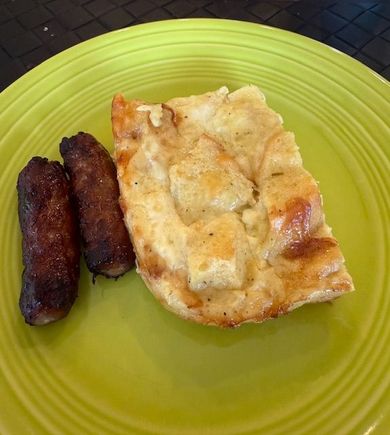 Leftover egg strata made with French bread, chicken broth, white wine and Gruyere with Farmer John maple sausage links. 