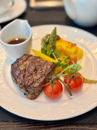 Wagyu beef striploin with truffle polenta, king oyster mushroom, vine cherry tomatoes, grilled vegetables, beef jus. 9/10 - beef perfectly mid rare but the truffle polenta was slightly bland.