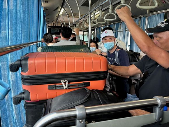 There were 3 luggages on top of Mike´s luggage  because we were heading to T1, the last stop.