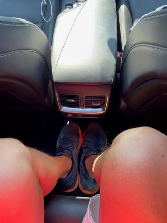 Rear Seat Legroom - no middle bump. I cant fit my shoes on an X3 in this same position. 