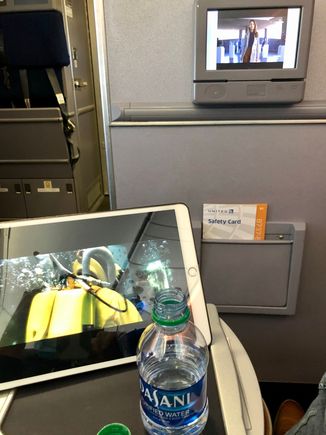 
Service started with mini Dasani water bottles and drink orders.
