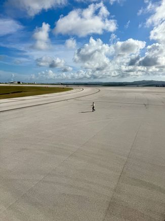 Standard friendly JAL wing walker escort and wave off