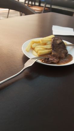 Steak and chips made to order from Priority Pass Lounge Brisbane international airport 
