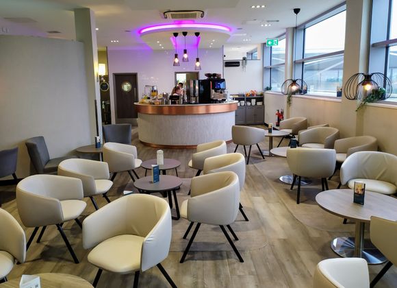 Typical business lounge seating area, although the circular food and drink area was well designed