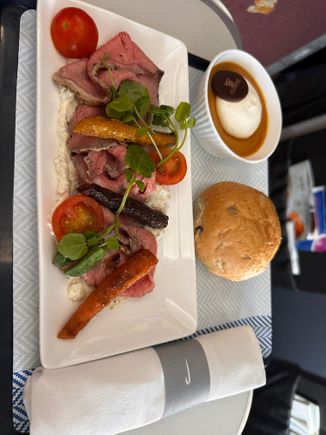 Express mid morning.  Beef salad - I made it all into a roll.  Todays random Do&Co dessert chocolate and caramel - very good.