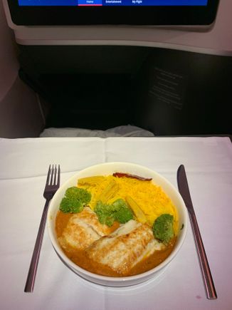 Spiced curried branzino with saffron basmati rice and vegetables 