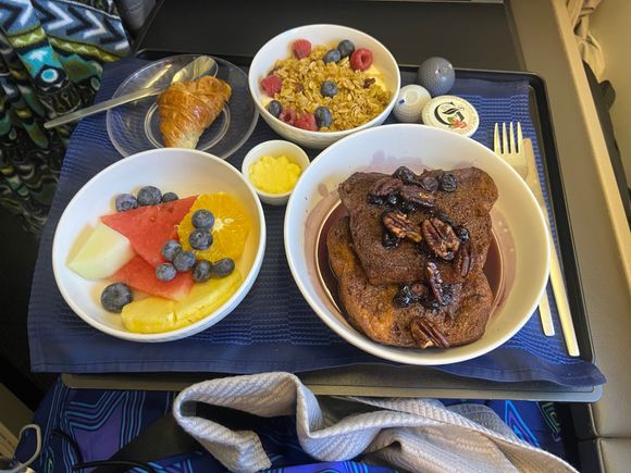 Blueberry pecan French toast with granola yogurt parfait and fresh fruit