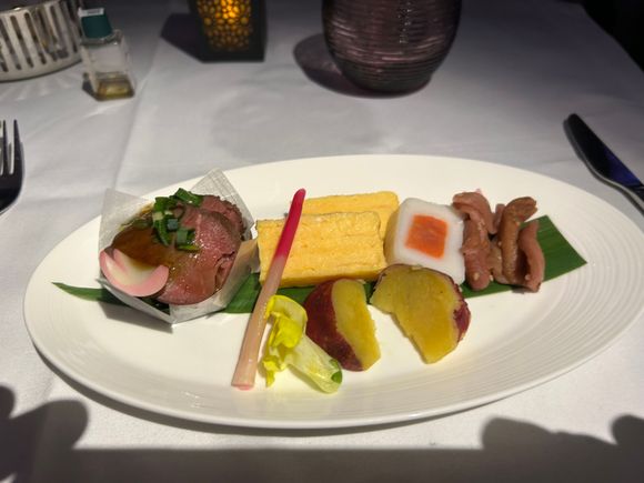 Japanese appetisers - 2 types of meat and a rolled omelette, plus a fish jelly. Husband enjoyed this .