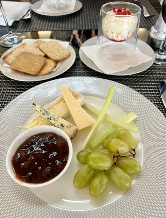 Cheese plate and Eton mess dessert