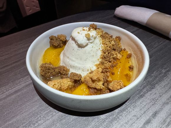 Vanilla gelato - roasted peaches, hazelnut shortbread crumble.  Very good as usual!!