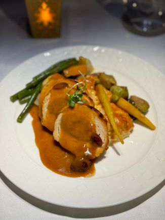 Traditional turkey roulade with cranberry jus