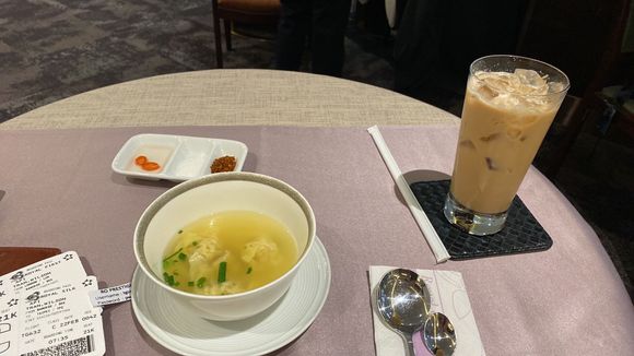 Shrimp wonton and iced chai coffee 
