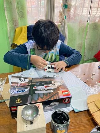 The Lego Lambo just couldn't wait - not even for the photoshoot. And no, he didn't mind at all doing it over the account books......