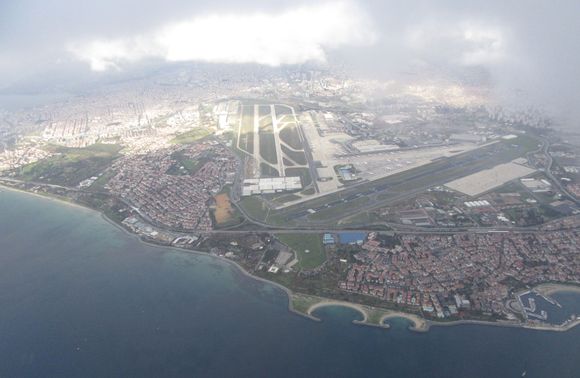 Old IST seen through a gap between rain showers on approach to new IST. Note all the Covid-parked TK aircraft.