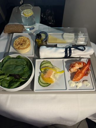 Lobster starter and salad, with cheese and dessert course served on the tray on short red eyes