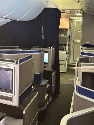 Note the curtain around seat 1A - used for pilot rest.