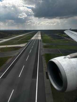 Just before touch down in runway 07C; crossing runway 18/36 looking to the south. This runway is used for departures. 