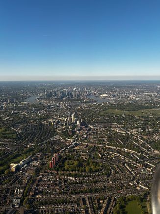 Canary Wharf estate, Isle of Dogs in the distance. LCY is to the right of this picture 