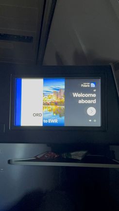 I took a quick nap after having been up all-night delivering babies but I did awaken to raid the classy, wicker snack basket.  You can see all of my luxurious first-class booty. Thanks United!!
