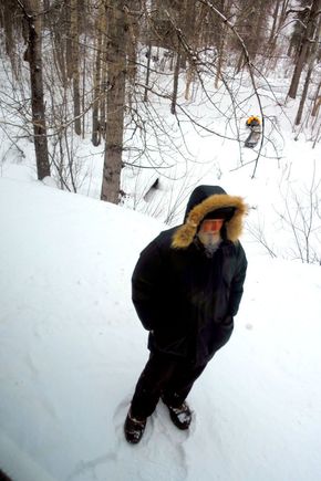 One of the "flag stop" passengers - his snowmobile and sled are sitting off in the distance - above his head in the pic.