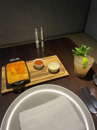 Cornbread and the Navy Fog cocktail, both excellent.