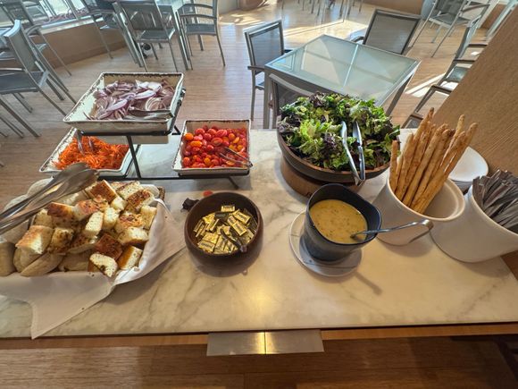 With rotating salad greens.