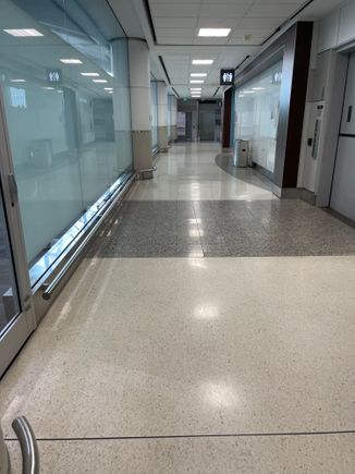 Hallway to NEXUS/GE door.