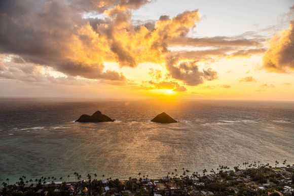 A sunrise view of "The Mokes" in Oahu.