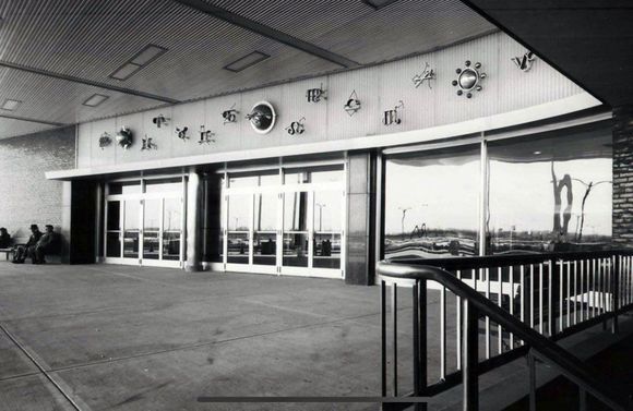 The original location of the sculpture on the facade of the 1956 terminal. 