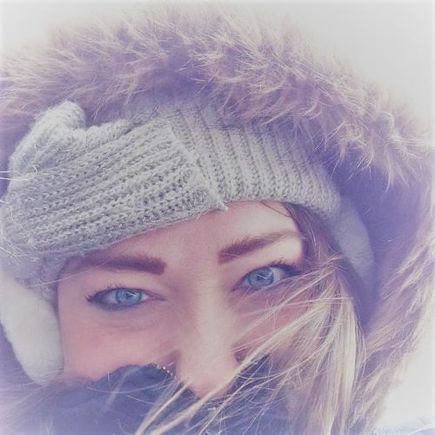 Me on a very cold boat trip in New York.