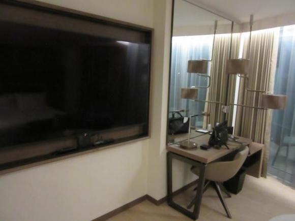 TV & Desk Area -- gigantic TV but not fully set up yet