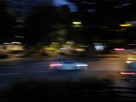 Supercar going 90 mph on Park Lane